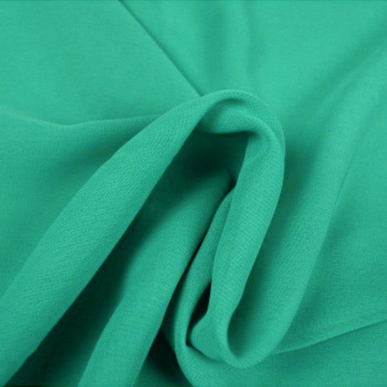 TURKIS CHIFFON – LET, GENNEMSIGTIG & MED FLOT FALD