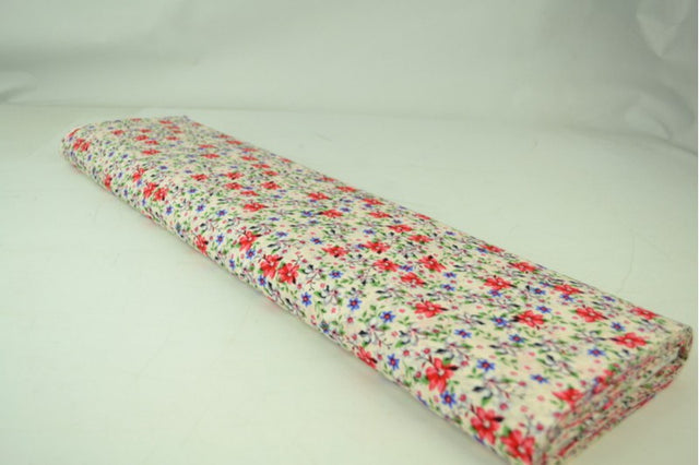 CREME BOMULDSPOPLIN MED MULTIFARVET DITSY BLOMSTERPRINT