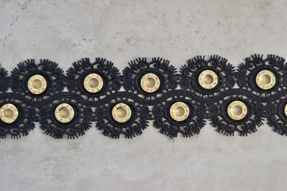 SORT BLOMSTERBÅND MED GULD RINGE 55MM