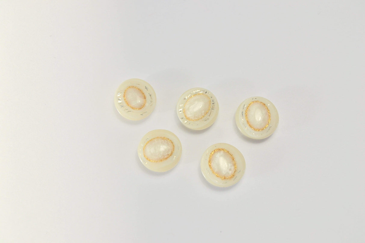 CREMEFARVET KNAPPER MED GULD GLIMMER 5 STK.