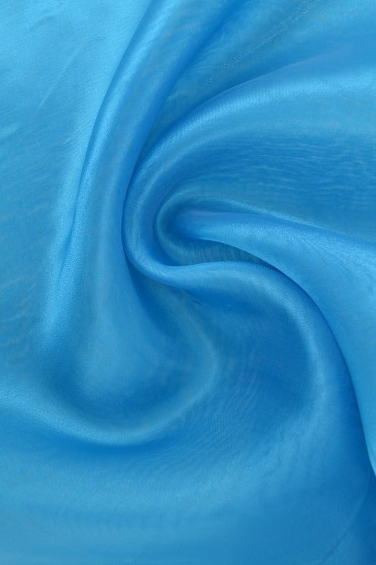 PETROLEUMSBLÅ ORGANZA – TRANSPARENT & SKINNENDE