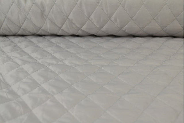 SØLVGRÅ QUILT STOF MED VATTERET BAGSIDE