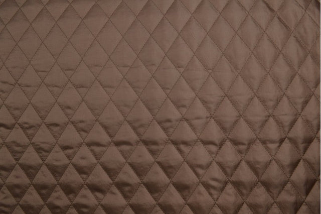 BRUN QUILT STOF MED VATTERET BAGSIDE