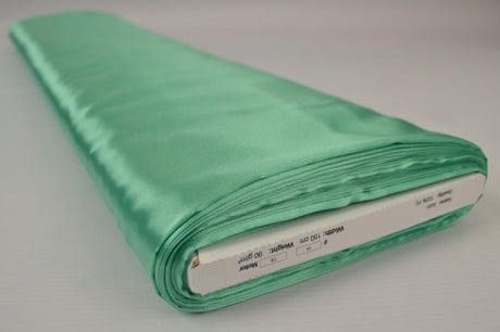 MINTGRØN SATIN STOF – LET & GLANSFULDT