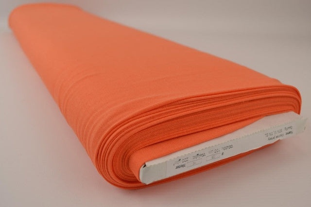 MØRK ORANGE VISKOSE JERSEY – BLØD, ÅNDBAR & STRÆKBAR