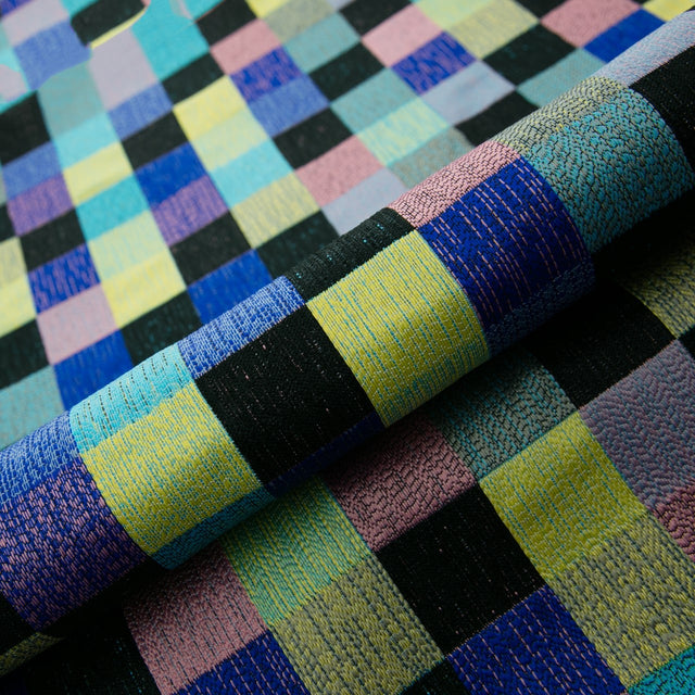 LIMEGRØN KONFETTI-TERN PÅ SORT BARCELONA JACQUARD DEKORATIONSSTOF – KONFETTI-TERN