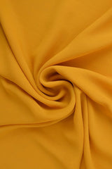 KARRY GUL CHIFFON – LET, GENNEMSIGTIG & MED FLOT FALD