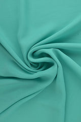TURKIS CHIFFON – LET, GENNEMSIGTIG & MED FLOT FALD