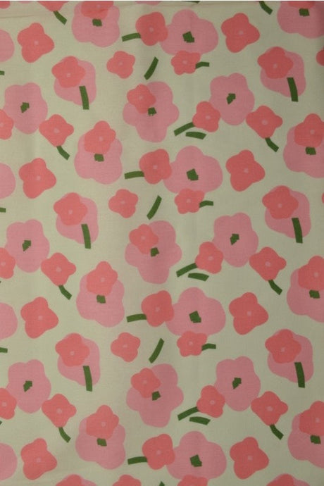 CREME BOMULDSPOPLIN MED VALMUEPRINT – PINK & GRØN