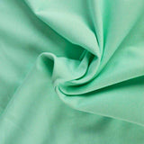 MINTGRØN BOMULDSJERSEY – NATURLIG, ÅNDBAR & STRÆKBAR