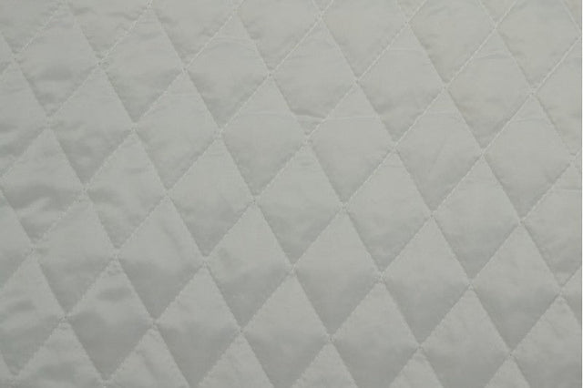HVID QUILT STOF MED VATTERET BAGSIDE