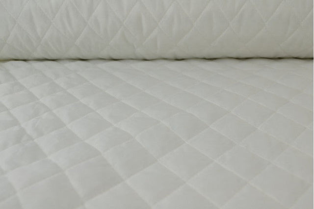 HVID QUILT STOF MED VATTERET BAGSIDE