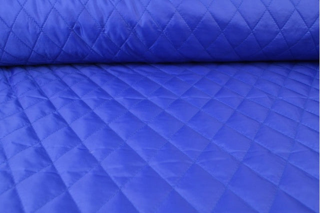 MØRKEBLÅ QUILT STOF MED VATTERET BAGSIDE