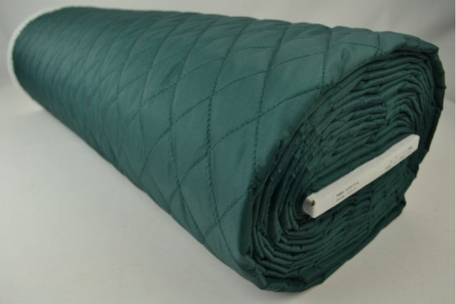 MØRKEGRØN QUILT STOF MED VATTERET BAGSIDE