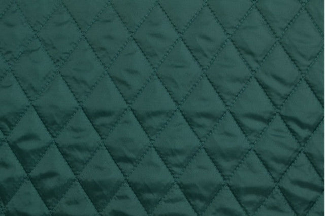 MØRKEGRØN QUILT STOF MED VATTERET BAGSIDE