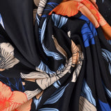 SORT LYCRA – TROPISK BLOMSTERPRINT, 4-VEJS STRÆK & HURTIGTØRRENDE