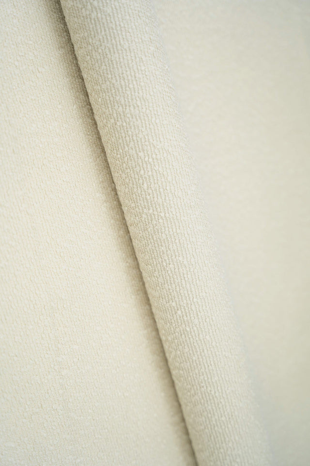 CREMET HØRHVID SANDU MØBELSTOF – BOUCLÉ-LOOK & BRANDHÆMMENDE