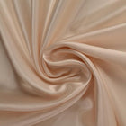 CHAMPAGNEFARVET SATIN STOF