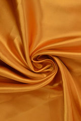 SOLGUL/GULD SATIN STOF – LET & GLANSFULDT