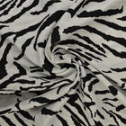 VISKOSE STOF MED ABSTRAKT ZEBRAPRINT