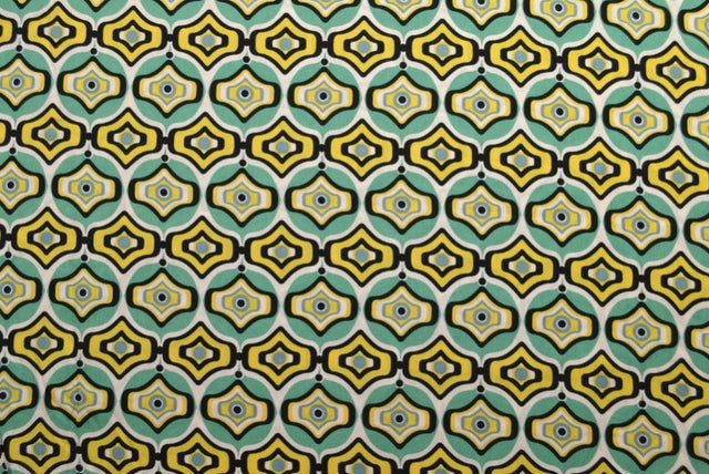 VISKOSE STOF MED TURKIS OG GULT GEOMETRISK BUE PRINT – LET FALD & ELEGANT MAT GLANS