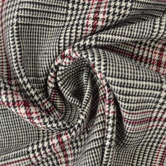 SORT, HVID OG RØD TWEED MED HOUNDSTOOTH TERN